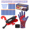 A set of Spider Launch toys including a foam dart launcher, a red glove, and several blue darts.