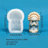 A white silicone mold of a praying girl is shown next to the finished light blue decorative figure.