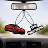 A custom photo car air freshener hangs from a rearview mirror, featuring a red car silhouette and a logo.