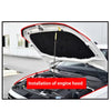 Installation of an engine hood on a white car, showing the opening and interior components.