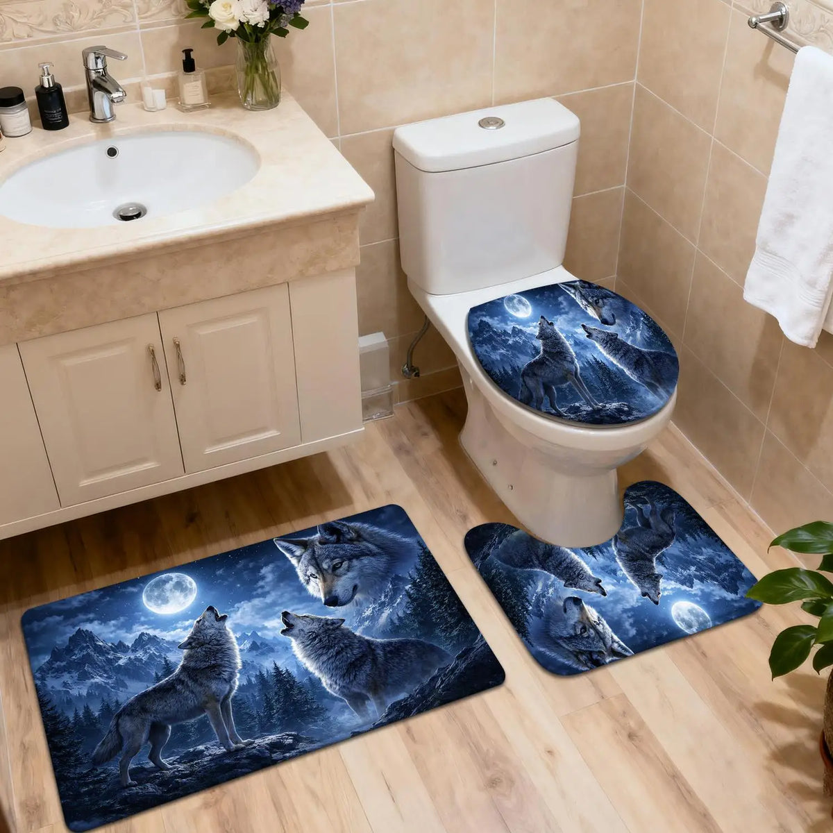 A set of three blue and white moonlit wolf bathroom mats placed on a wooden floor next to a sink and toilet.