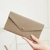 A beige slim RFID-blocking PU leather wallet shown in various views and being held by a hand.