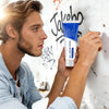 A man applies Wall Repair Paste to a white wall, demonstrating the drywall repair kit.