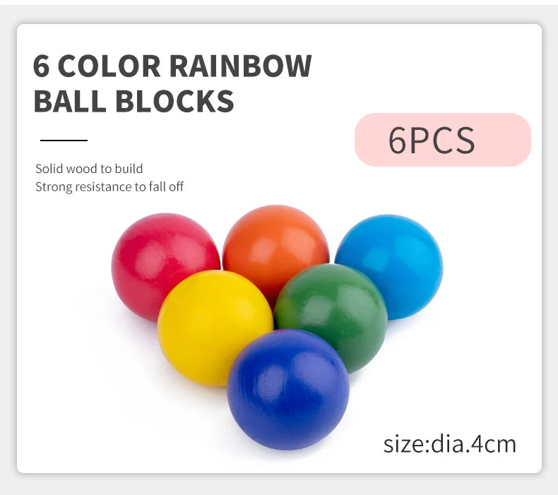 Six colorful rainbow ball blocks made of solid wood, with a blue block in the foreground.