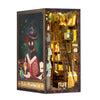A DIY book nook kit featuring a dark, ornate shelf display with various books and items illuminated by LED lighting.
