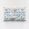 A rectangular pillowcase featuring a repeating pattern of cute, gray and white cartoon bears on a blue background.