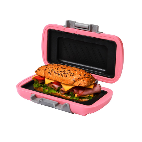 Un compacto rosa y una cafetera para desayuno con la tapa abierta y una hamburguesa.