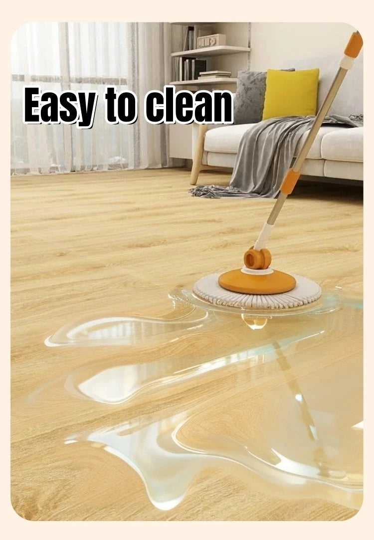 A mop is cleaning a wooden floor, showing water streaks and a glossy finish on the wood grain.