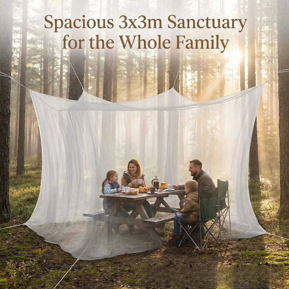 A family is enjoying a meal under a spacious 3x3 meter mesh fly net sanctuary in a forest setting.