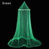 A green elegant lace canopy mosquito net draped over a surface.