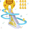 A yellow duck stair climbing track toy featuring lights and music.