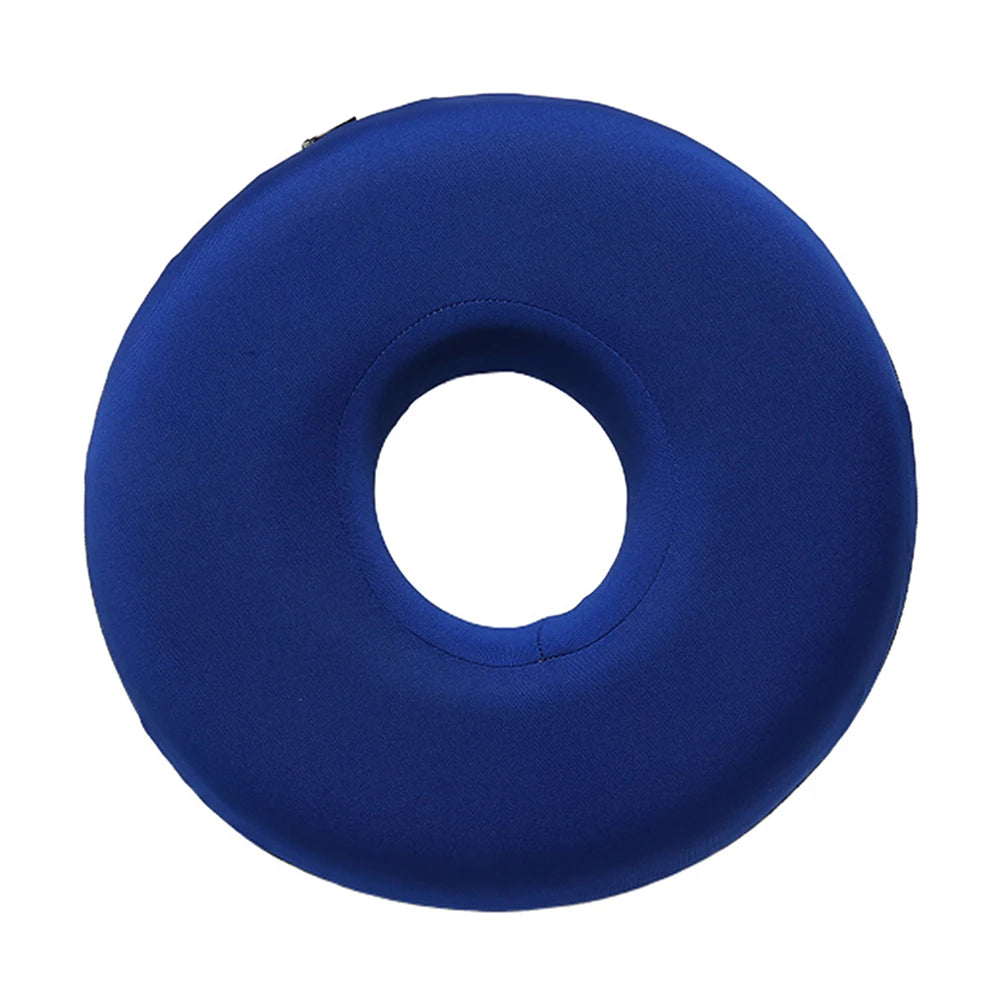 A deep blue memory foam ear piercing pillow with a cutout for side sleepers.