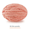 A ball of pink 06-Skin powder, a fine textured cosmetic product.