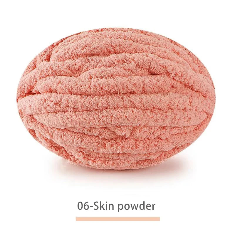 A ball of pink 06-Skin powder, a fine textured cosmetic product.