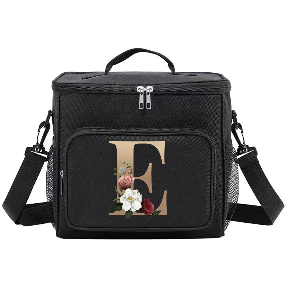 Black insulated canvas lunch bag with a gold initial E and floral accents