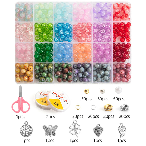 A glass bead jewelry making kit featuring various colors of beads and tools including pliers and findings.