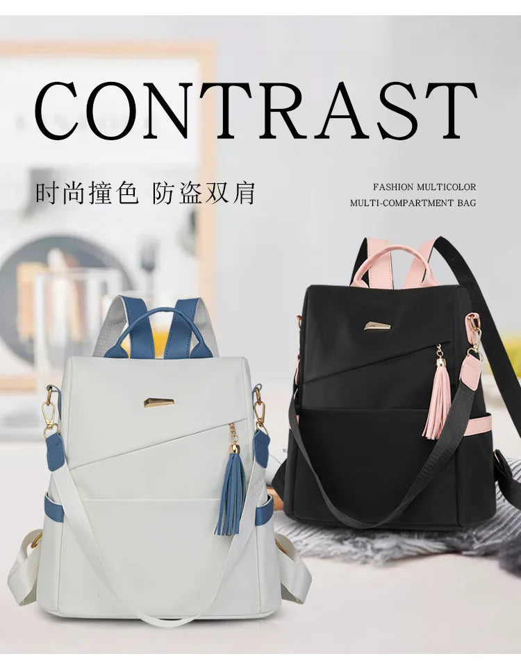 A light gray backpack with blue accents is shown next to a black backpack, highlighting contrast and multi-compartment featur