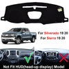 Black custom-fit dashboard cover for Silverado and Sierra trucks, designed to fit HUD displays.