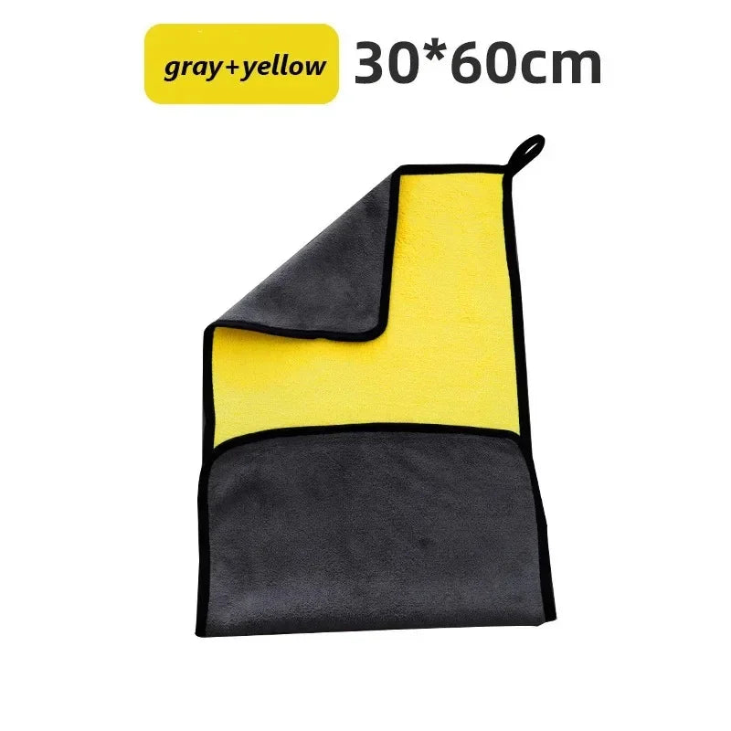A rectangular microfiber car cleaning towel in gray and yellow colors.