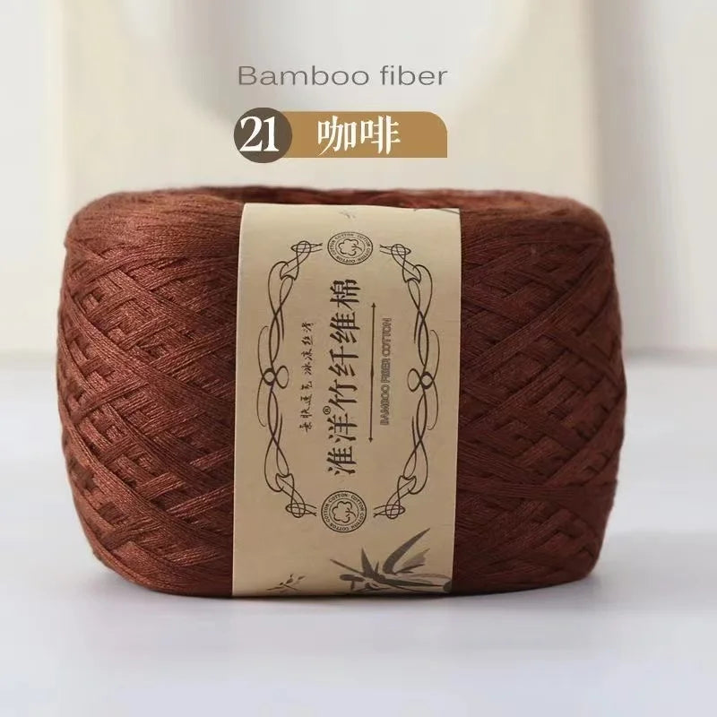 A ball of reddish-brown bamboo fiber yarn for knitting and crochet