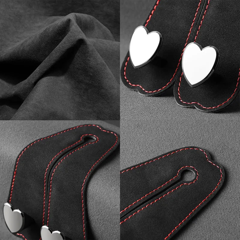 Black car seat headrest hook with dual heart-shaped hooks for securing bags and phones