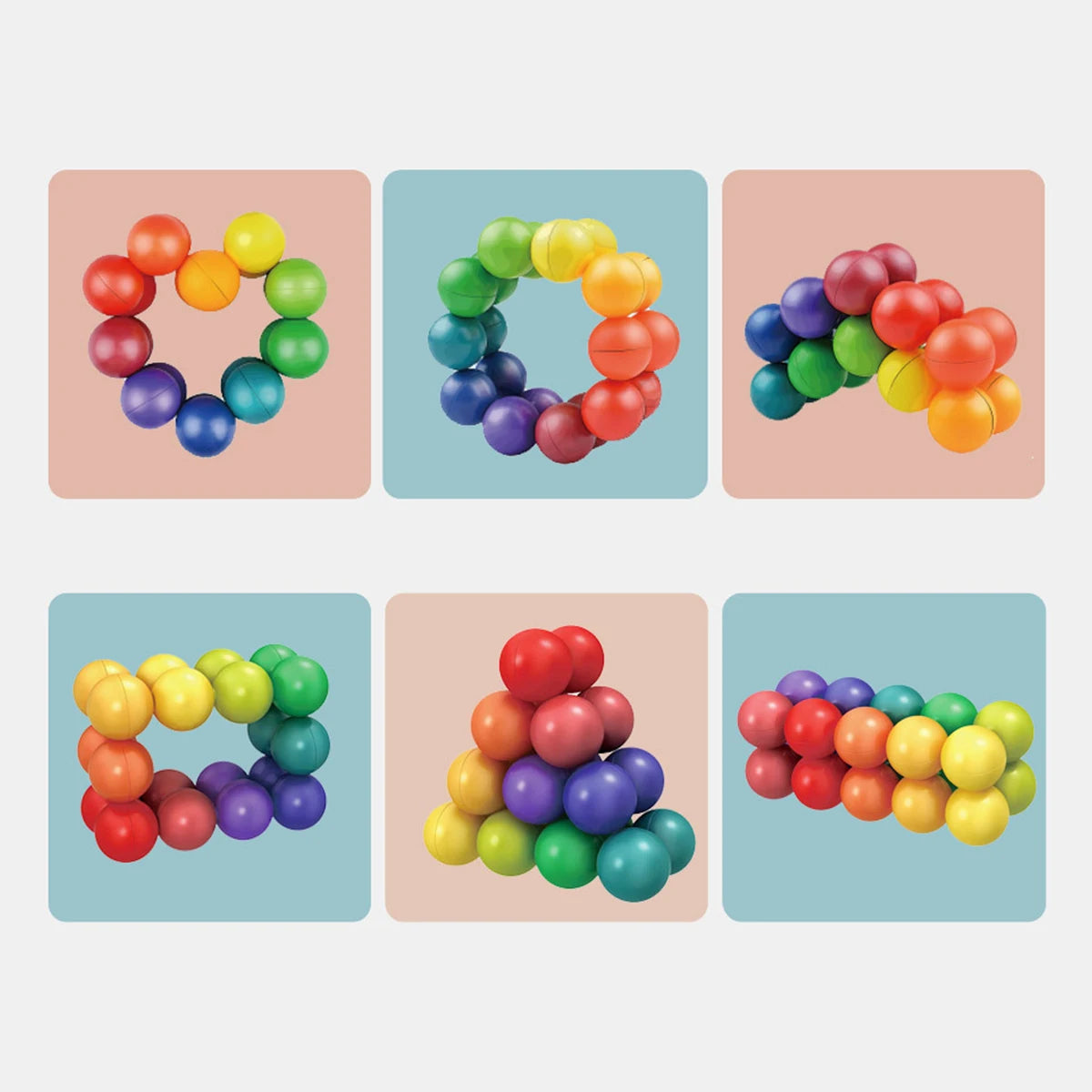 A collection of colorful, spherical fidget balls in various shades of red, yellow, green, and blue arranged in heart shapes a