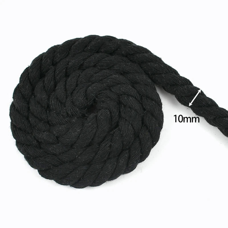 A ball of black natural twisted cotton cord with a 10mm thickness.