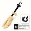 Adjustable wooden shoe stretcher tool with a black handle and wooden sole for men and women