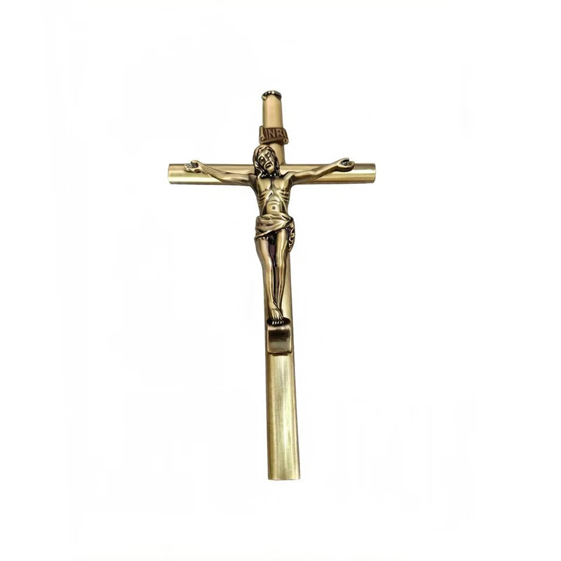 A brass crucifix pen set featuring a Jesus cross design for writing.