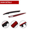 Close-up view of red reflector light covers for a Chrysler 300 rear bumper.