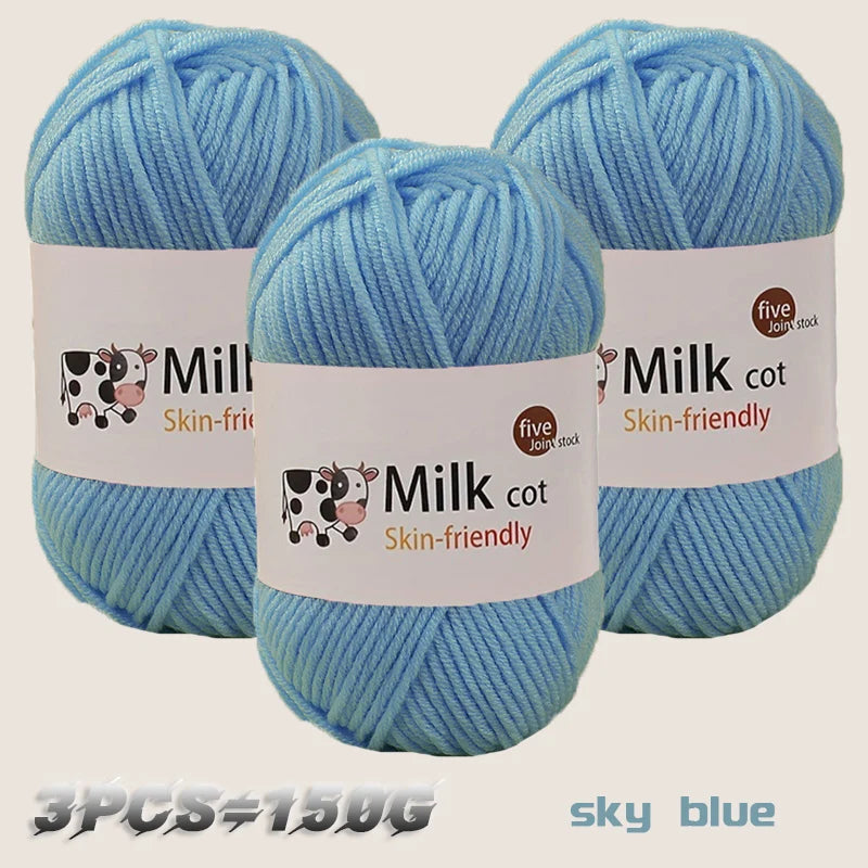 Three skeins of sky blue milk cotton yarn are displayed, showing the texture and labeling.