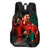 A black backpack featuring a graphic of a soccer player celebrating with a red shirt.
