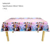 A pink and purple tablecloth decorated with illustrations of various people in a music-themed style for a birthday party.
