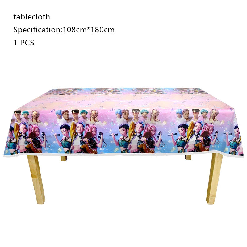 A pink and purple tablecloth decorated with illustrations of various people in a music-themed style for a birthday party.