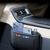 A black organizer bag with a clear window is placed in the side pocket of a car door, holding several smartphones.