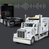 A white 1:24 scale diecast Peterbilt 389 heavy truck model with pull-back action, sound, and lights.