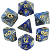A set of seven polyhedral dice in various shades of blue and black glass