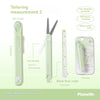 A light green pen-shaped measuring tool with a detachable cutter and ruler, shown next to its packaging.