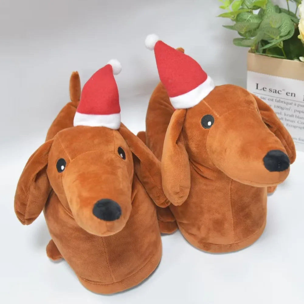 A pair of brown plush dog slippers with red and white Santa hats, resembling a dachshund's head.
