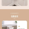 White foldable hanging trash bins displayed in a kitchen cabinet context.
