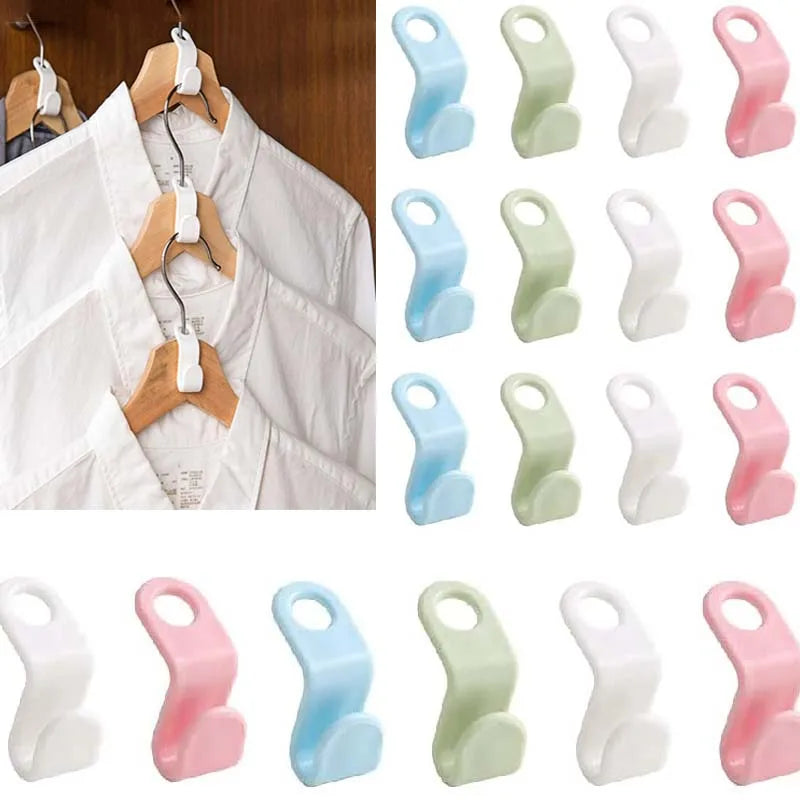 A collection of light blue and pink plastic hooks used as connectors for space-saving clothes hangers.