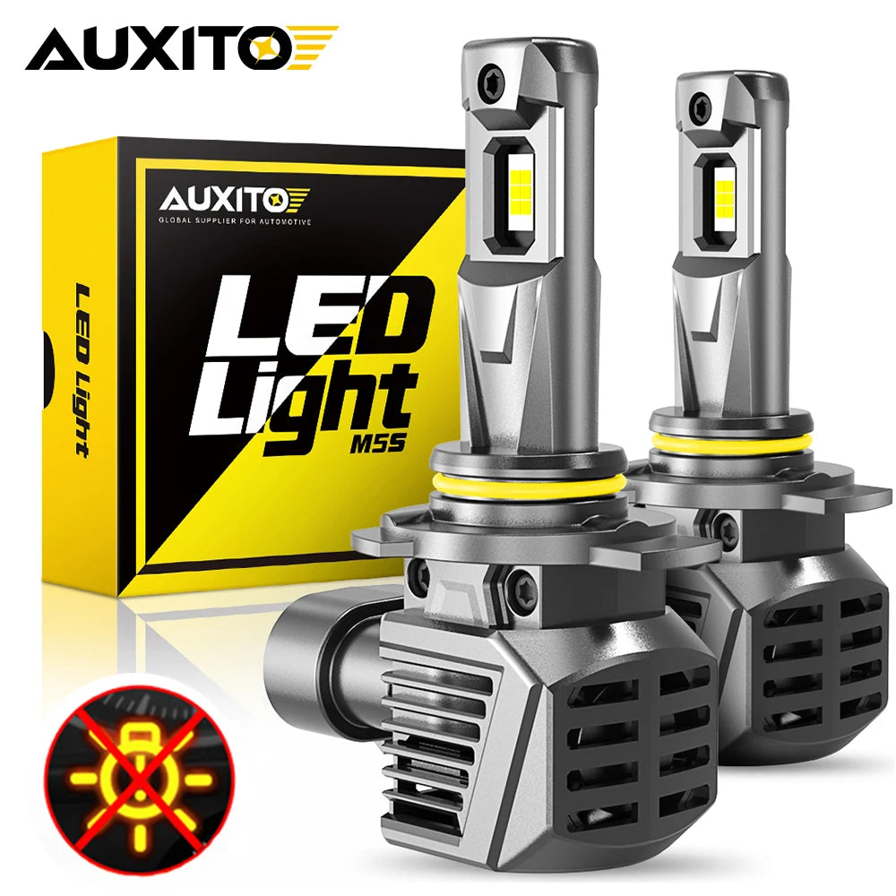 A box and two LED light bulbs from AUXITO for automotive headlights are shown.
