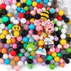 A collection of 45 round silicone 3D animal beads in various colors and shapes for jewelry making