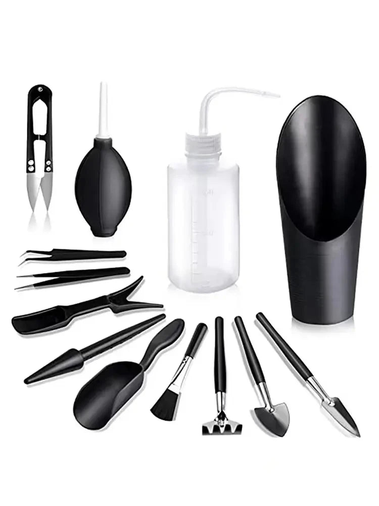 A black succulent and bonsai gardening tool kit featuring various small tools like tweezers, scoops, and a pipette.