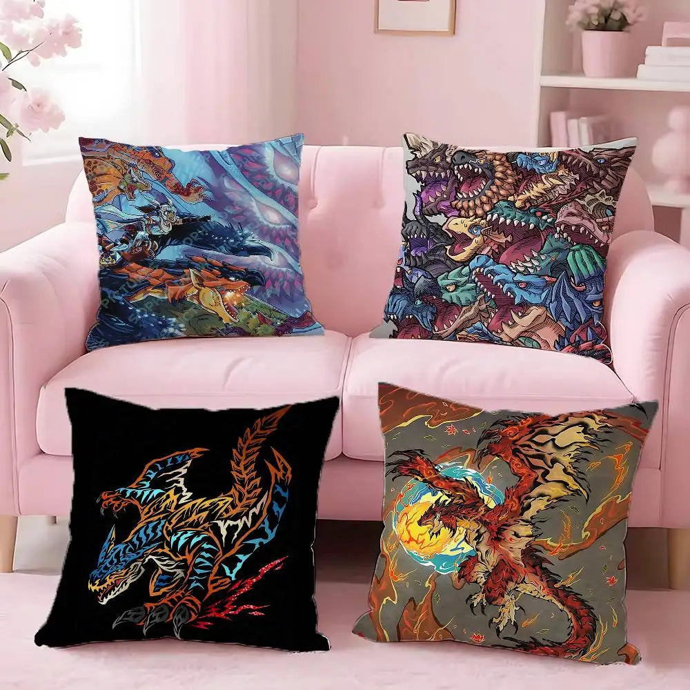 A set of cushions featuring printed designs of Monster Hunter Rathalos and Nargacuga dragons on a pink sofa.