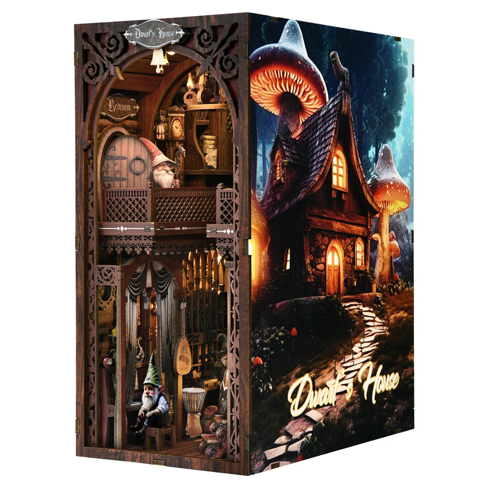 A DIY book nook kit featuring a detailed miniature house scene with LED lighting and surrounding elements.