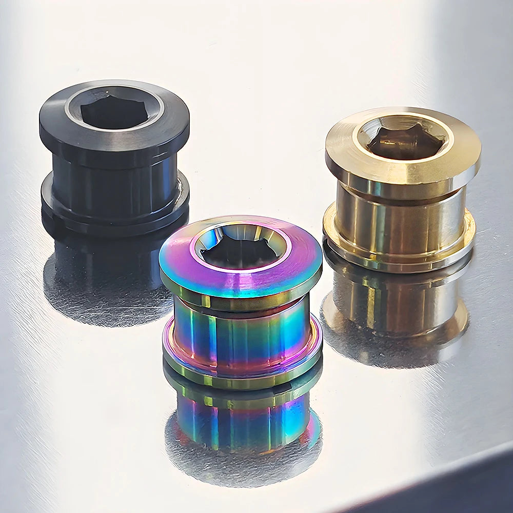Three titanium alloy chainring bolts shown in various finishes and angles.