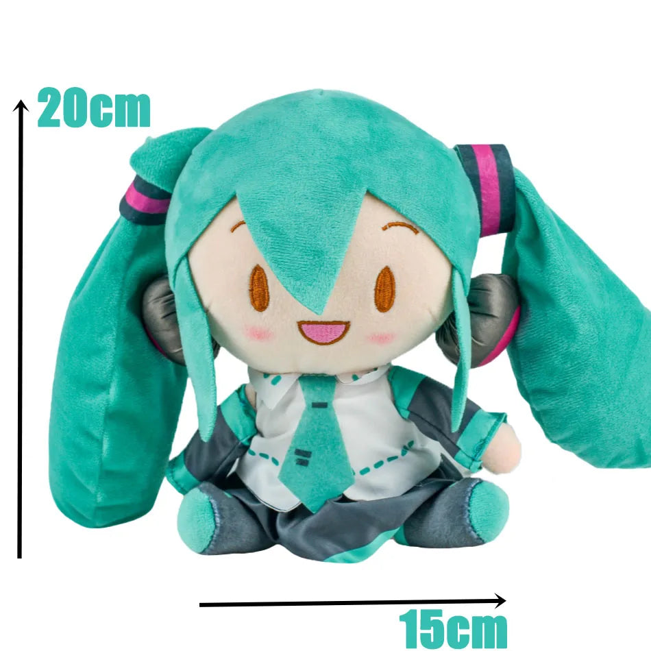 A soft teal Hatsune Miku plush doll figure with large ears and a smiling face.