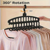 Black multi-layer space-saving closet organizer hangers demonstrating 360 degree rotation.