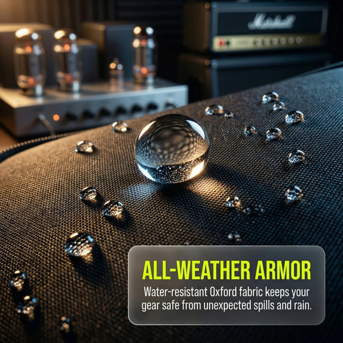 A close-up of a black fabric surface with water droplets, showing the texture and protective qualities of an all-weather armo